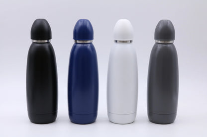 Four sleek insulated Bullet Bottle water bottles in black, blue, white, and gray colors standing upright on a white background