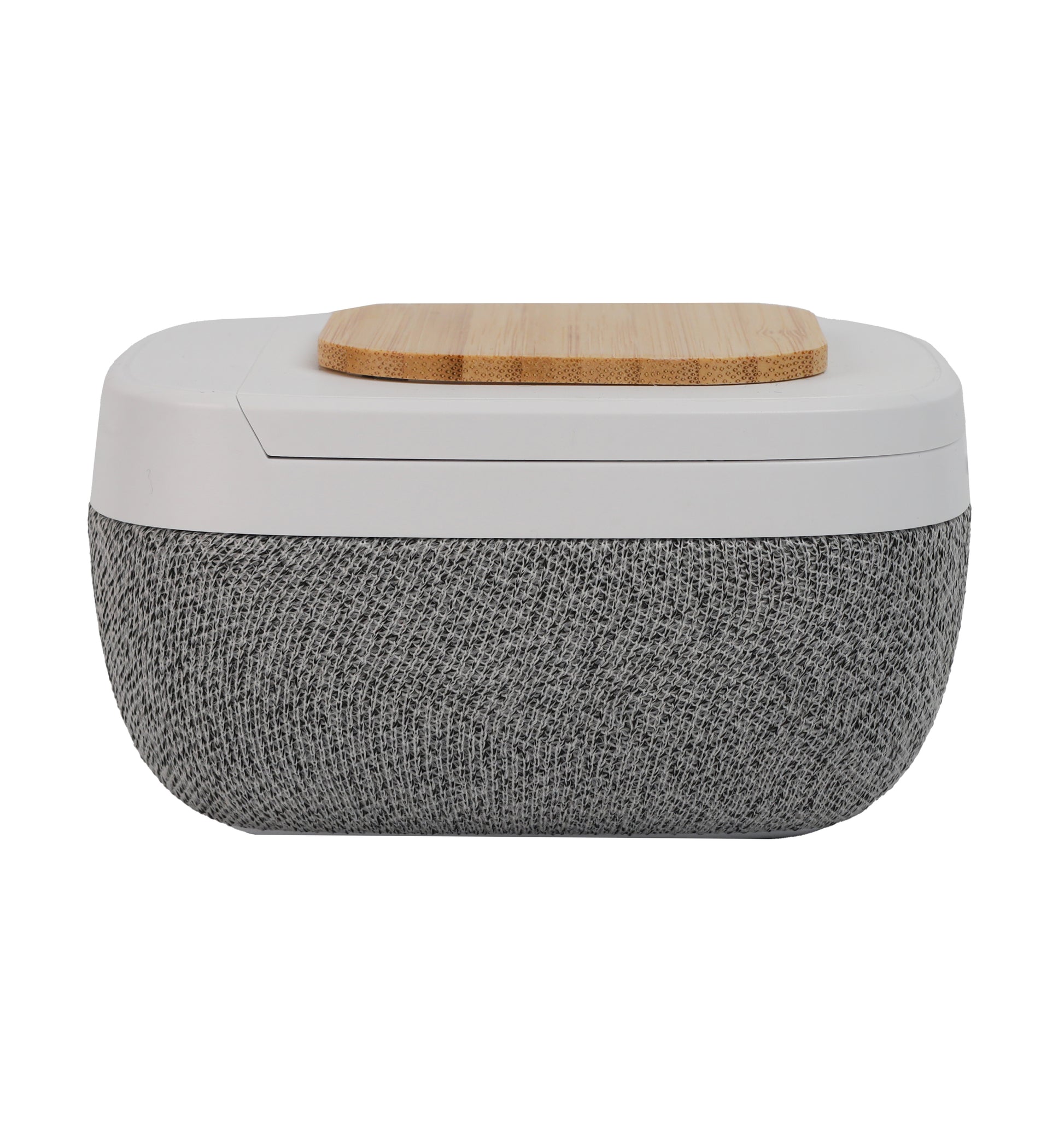 Bluetooth Speaker with Wireless Charging featuring fabric speaker cover and wooden top charging pad in modern design