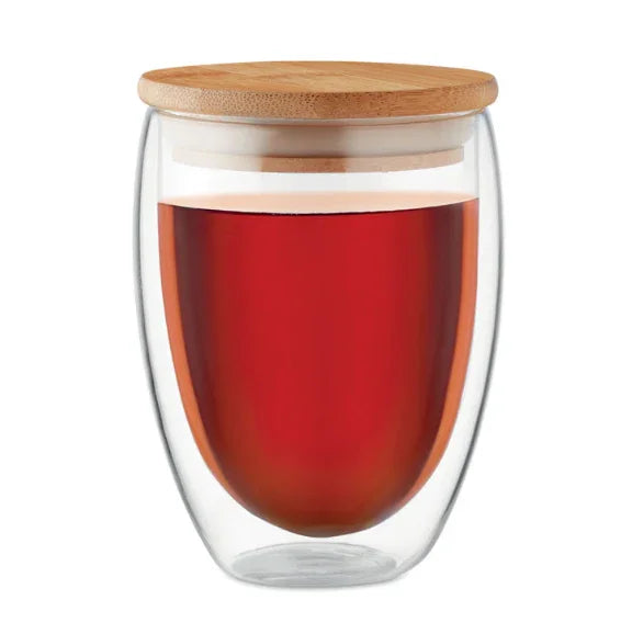 Double Wall 350ml Glass Tumbler with wooden lid filled with dark red liquid isolated on white background