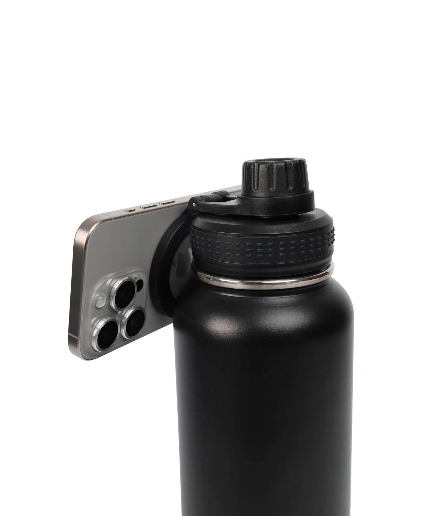 Magnetic Lid Stainless Steel Bottle in black with a phone magnetically attached to the lid, showing functionality and design.