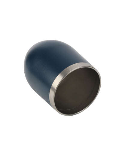 Tumbler with navy blue exterior and stainless steel interior shown lying on its side on a white background