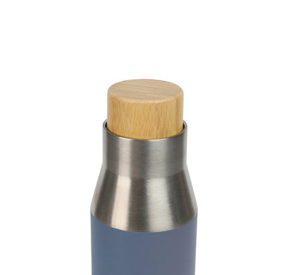 Close-up of a stainless steel Vacuum Bottle with a blue body and a natural wooden lid on a white background