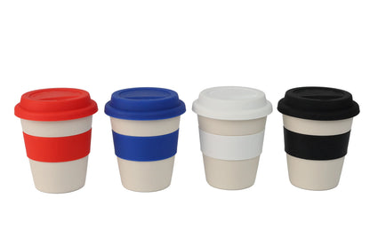 Wheat Straw Silicon Lid Tumbler in red, blue, white, and black silicone bands and lids on beige cups.